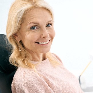 Woman smiling in the dental chair
