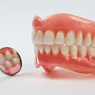 Dentures can restore a full mouth of teeth in one easy to wear prosthetic