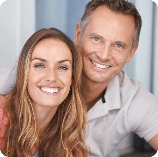 Man and woman smiling warmly
