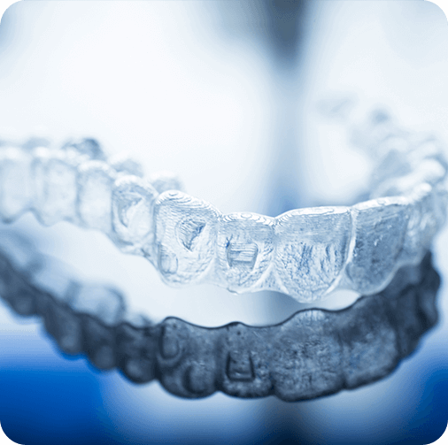 Clear aligner resting on a table