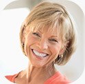 Smiling woman in pink shirt