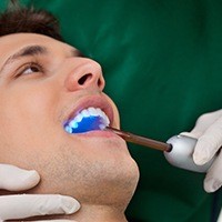 man receiving dental sealants