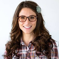 smiling young woman after tooth extraction