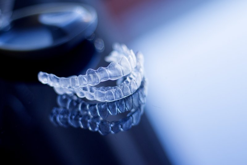 Invisalign braces for fixing bite problems in Parker on table