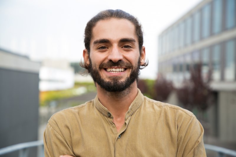 Younger man wearing dentures